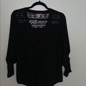 Candie’s black blouse roll-tab